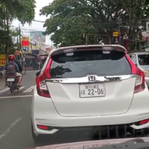 Diduga Untuk mengelabuhi e-TLE, Viral Pesan Berantai video Jazz RS Putih Ber-plat Nopol Jepang Di kota Malang